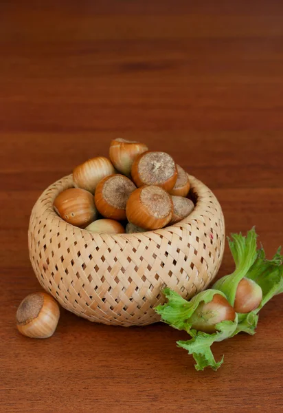 Hazelnuts in a basket — Stock Photo, Image