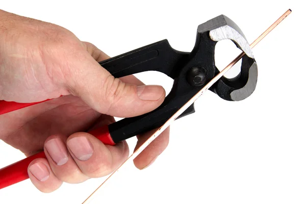 La mano de los hombres mantiene las herramientas del cerrajero, aisladas en un fondo blanco —  Fotos de Stock