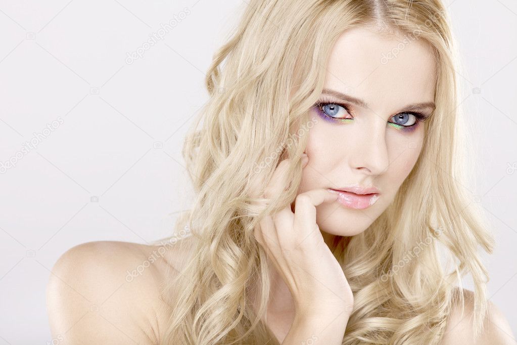 Young pretty woman with beautiful blond hairs