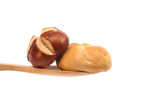 Um pão em uma colher — Fotografia de Stock