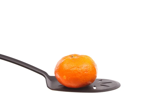 Tangerine på en ske - Stock-foto