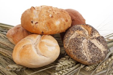 Various breadrolls on grain clipart