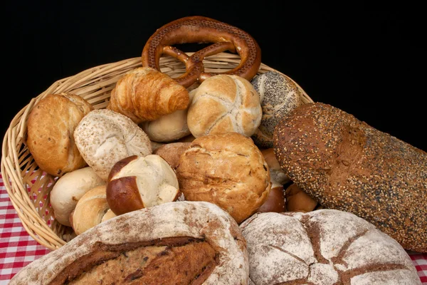 Bread against black — Stock Photo, Image