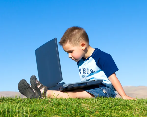 Little boy with laptop — Stock Photo, Image