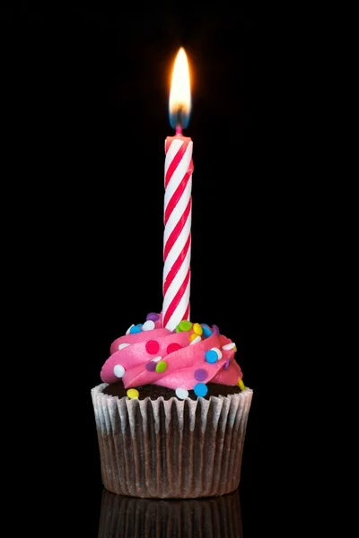 Cupcake with candle Stock Picture
