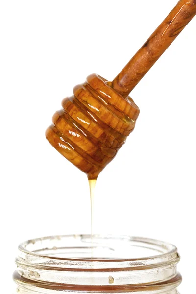 Honey from dipper — Stock Photo, Image