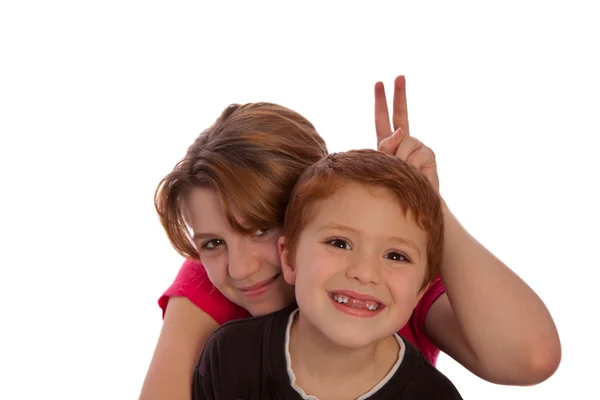 Brother and sister posing for a picture — Stock Photo, Image