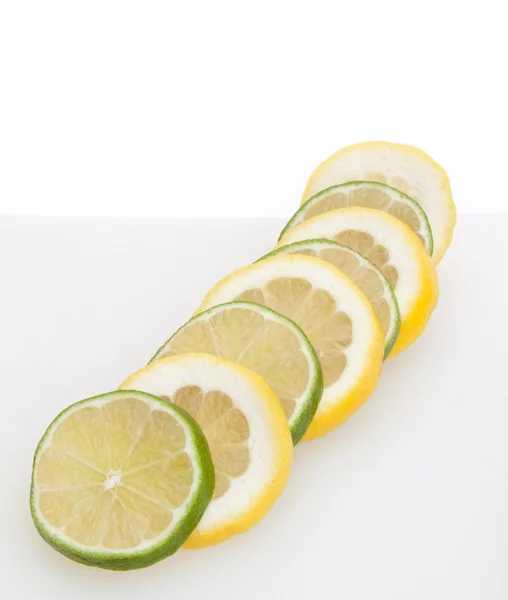 Slices of lemon and lime — Stock Photo, Image
