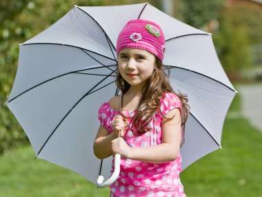 Young girl with umbrella clipart