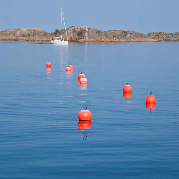Buoys in water — Stock Photo, Image