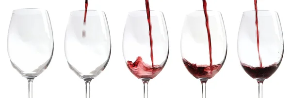 Rött vin som hälls — Stockfoto