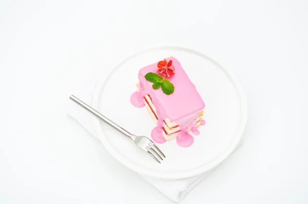 Маленькие торты с розовой глазурью — стоковое фото