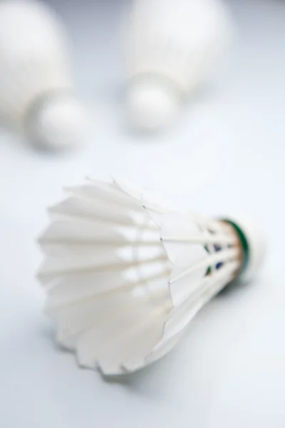 Badminton shuttlecocks on white (color toned image) — Stock Photo, Image