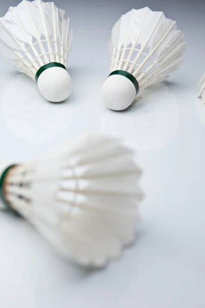 Badminton shuttlecocks on white (color toned image) — Stock Photo, Image