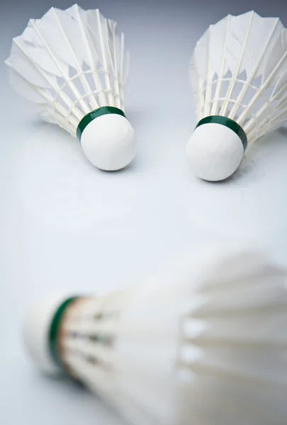 stock image Badminton shuttlecocks on white (color toned image)