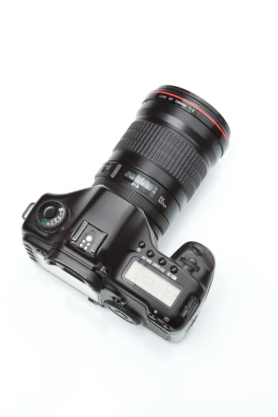 Modern DSLR with a telephoto lens — Stock Photo, Image