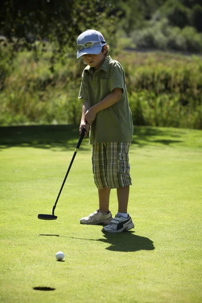 stock image Boy playing golf