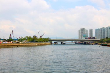 Bridge and coastline in Tuen Mun, Hong Kong clipart