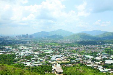 Hong Kong rural area with many apartment blocks clipart