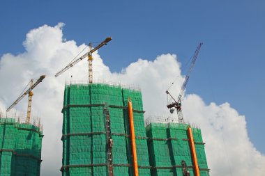 Construction site with crane and building clipart