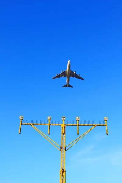 stock image Plane fly up over take-off runway from airport at daytime