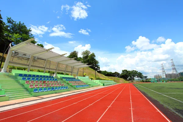 Stadion stoelen en running tracks — Stockfoto