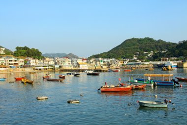 Coastal area with many fishing boats in Lamma Island, Hong Kong. clipart