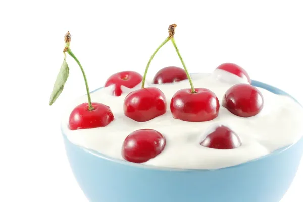 Cherries in cream Stock Image