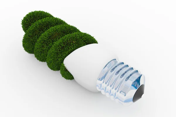 Energy saving lamp made of green grass — Stock Photo, Image