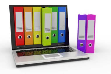 laptop ve renkli arşiv klasörleri.