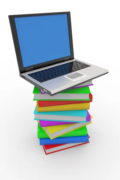 Laptop auf Bücherstapel — Stockfoto