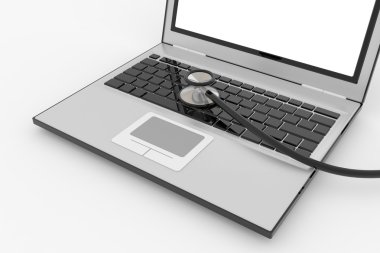 Stethoscope on laptop's keyboard clipart