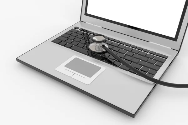 stock image Stethoscope on laptop's keyboard