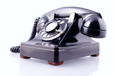 Vintage black rotary phone (with clipping path) clipart