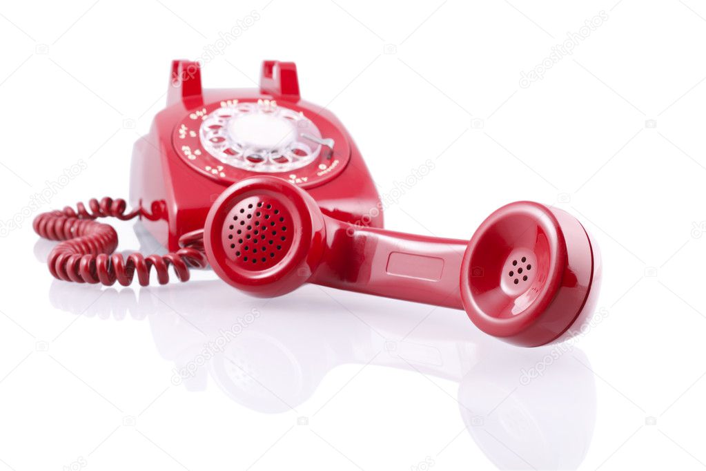 Vintage red rotary phone (with clipping path)