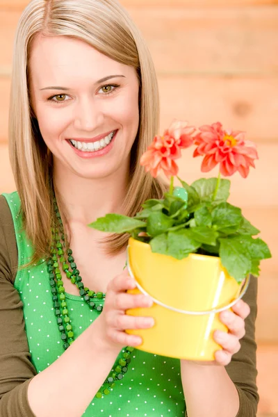 Portrait happy woman hold potted flower spring — Stock Photo, Image