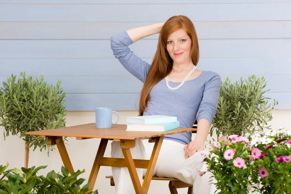 Summer terrace redhead woman relax in garden — Stock Photo, Image