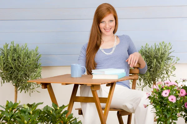 Summer terrace redhead woman relax in garden — Stock Photo, Image