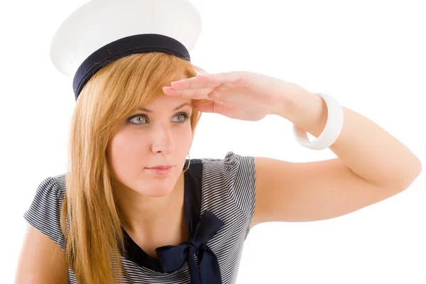 Молодая женщина-морпех салютует военно-морскому костюму — стоковое фото
