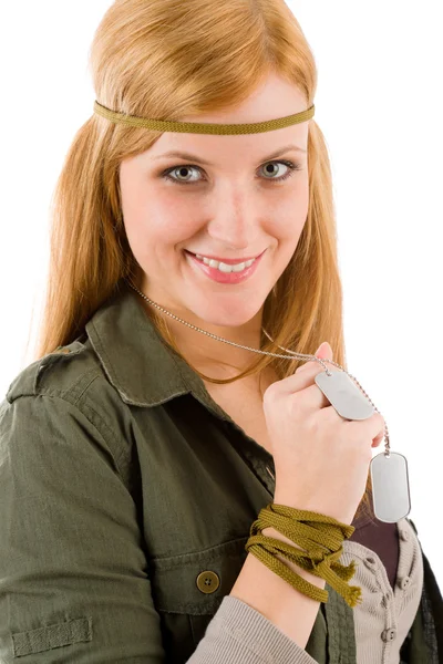 Hippie young woman in khaki outfit hold dog-tag — Stock Photo, Image