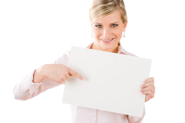 Businesswoman pointing front at empty banner — Stock Photo, Image