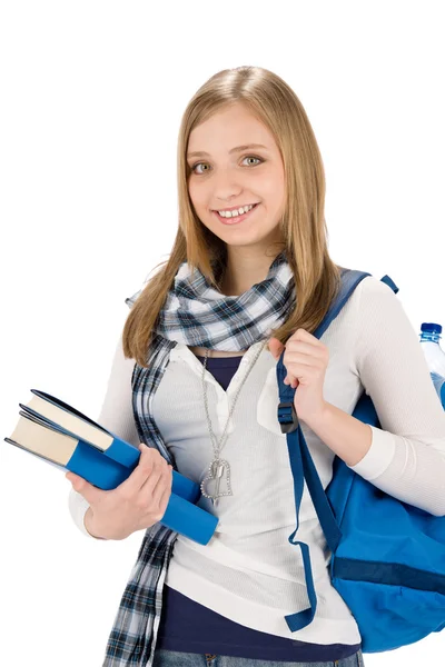 Student tonåring kvinna med skolväskan hålla böcker — Stockfoto