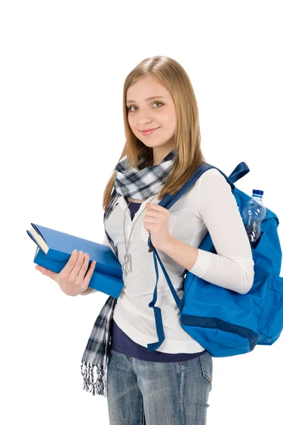 Студентська дівчина-підліток зі шкільною сумкою тримає книги — стокове фото
