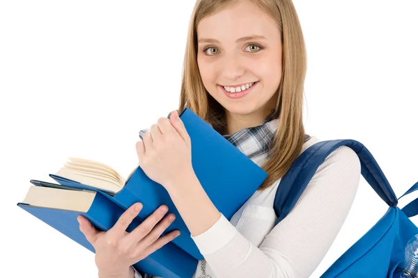 Student dospívající žena s ĺˇkolnĂ­ drží knihy — Stock fotografie