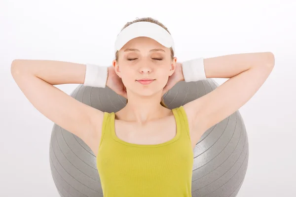 Fitness teenager woman with closed eyes — Stock Photo, Image