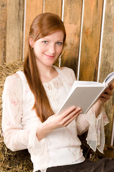 Young romantic woman in barn hold book — Stock Photo, Image