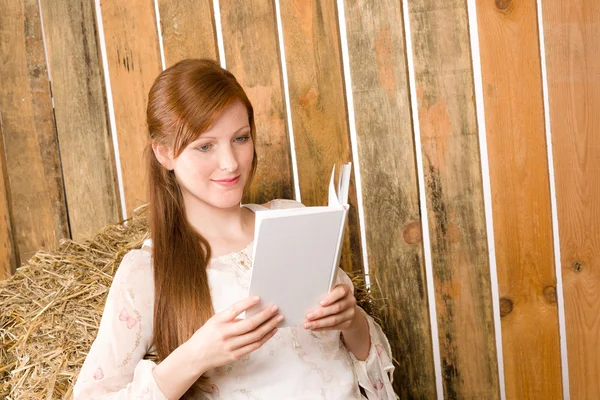 Young romantic woman in barn hold book — Stock Photo, Image