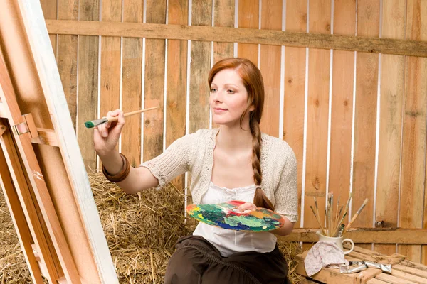 Red-hair romantic woman in barn painting country — Stock Photo, Image