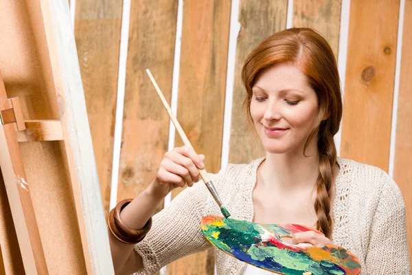 stock image Red-hair romantic woman in barn painting country