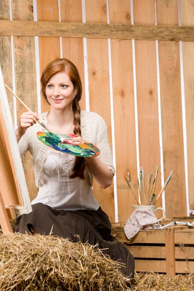 Red-hair romantic woman painting in barn country — Stock Photo, Image